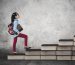 Picture,Of,Cute,Schoolgirl,Steps,On,Books,Stair,While,Holding